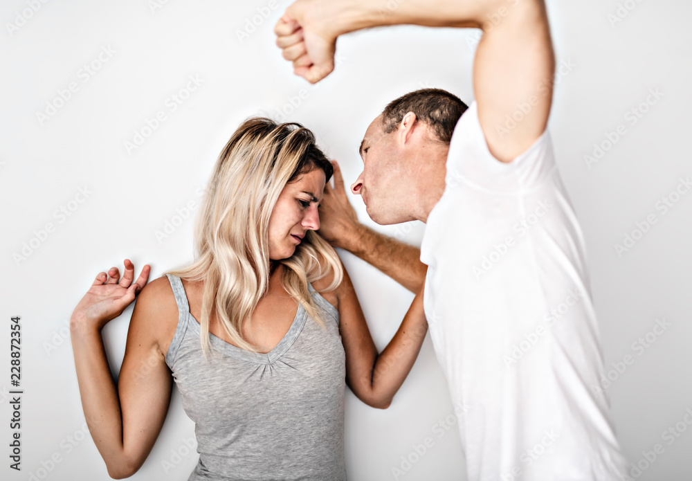 man beating helpless woman at home white background man beating helpless woman at home white background