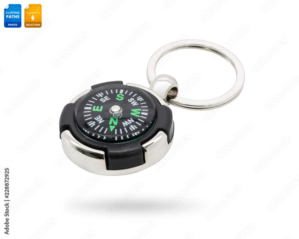 Modern compass in key chain concept isolated on white background. Metal key ring for tourism. Clipping paths object. Modern compass in key chain concept isolated on white background. Metal key ring for tourism. Clipping paths object.