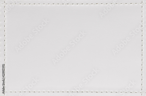 Seam and white leather texture background. Blank material made from animal skin for furniture.