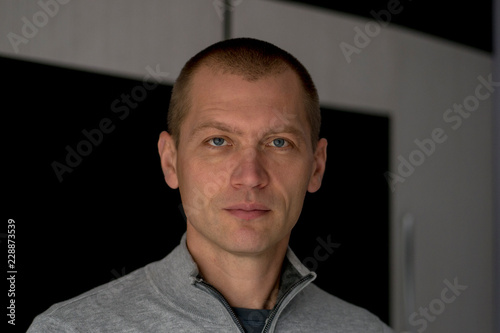 Close Up Portrait Of Man Standing on the room
