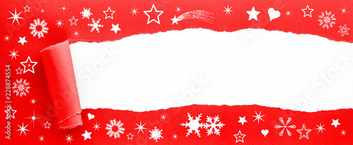 weihnachtliches Geschenkspapier aufgerissen - Ihre Botschaft auf weißer Fläche photo
