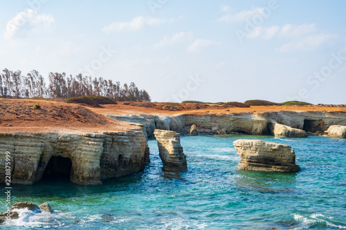 Beautiful rock formations and sea caves in Pegeia, Paphos, in Cyprus photo
