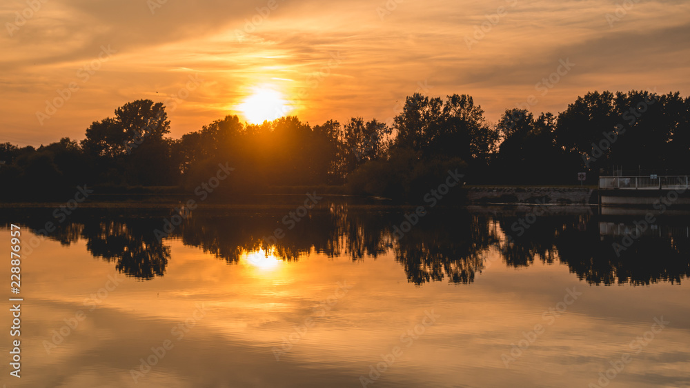 Beautiful sunset with reflections near Plattling - Isar - Bavaria Beautiful sunset with reflections near Plattling - Isar - Bavaria