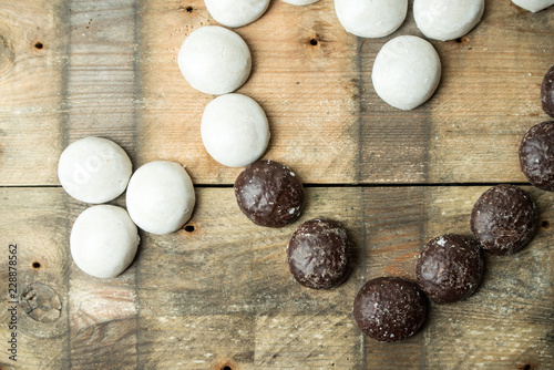 sweet, chocolate gingerbreads on wooden background