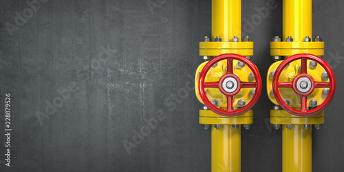 Gas pipeline valve on a wall. Space for text. Gas pressure control. photo