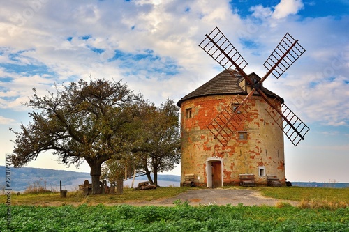 Beautiful old windmill in autumn time. Landscape photo with architecture at sunset (golden hour). Kunkovice - Czech Republic - Europe.