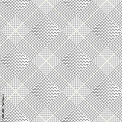 Seamless Prince of Wales check pattern in gray, white and pale golden cream. 