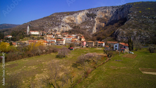 The Osp (Ospo) is a village close to Trieste just below a huge rock face of a steephead valley in western Slovenia. The place is well known for its rock walls, which offer free climbing all year long.