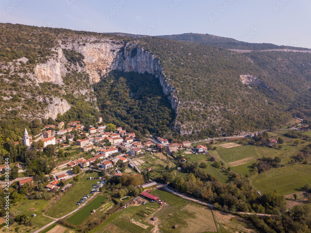 The Osp (Ospo) is a village close to Trieste just below a huge rock face of a steephead valley in western Slovenia. The place is well known for its rock walls, which offer free climbing all year long.