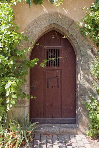 Weikersheim, Germany – old, wooden castle door
