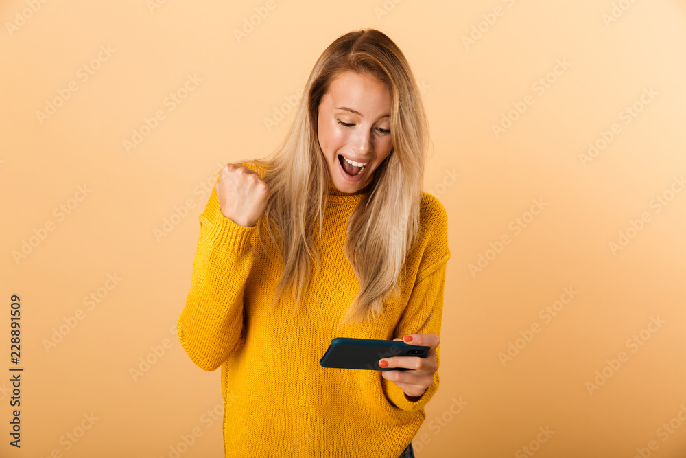 Portrait of a happy young woman dressed in sweater Portrait of a happy young woman dressed in sweater