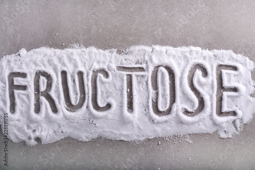 Fructose word written in fructose powder