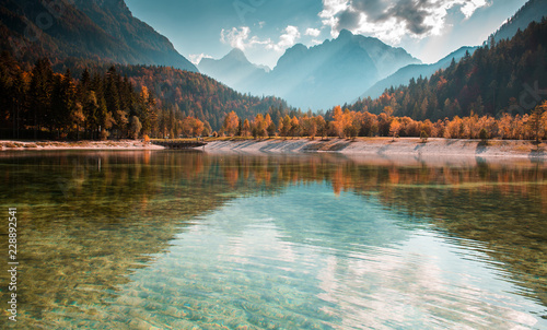 Colorful autumn landscape in the mountain village, Alps and mountain lake in Slovenia - Alpine scenery 