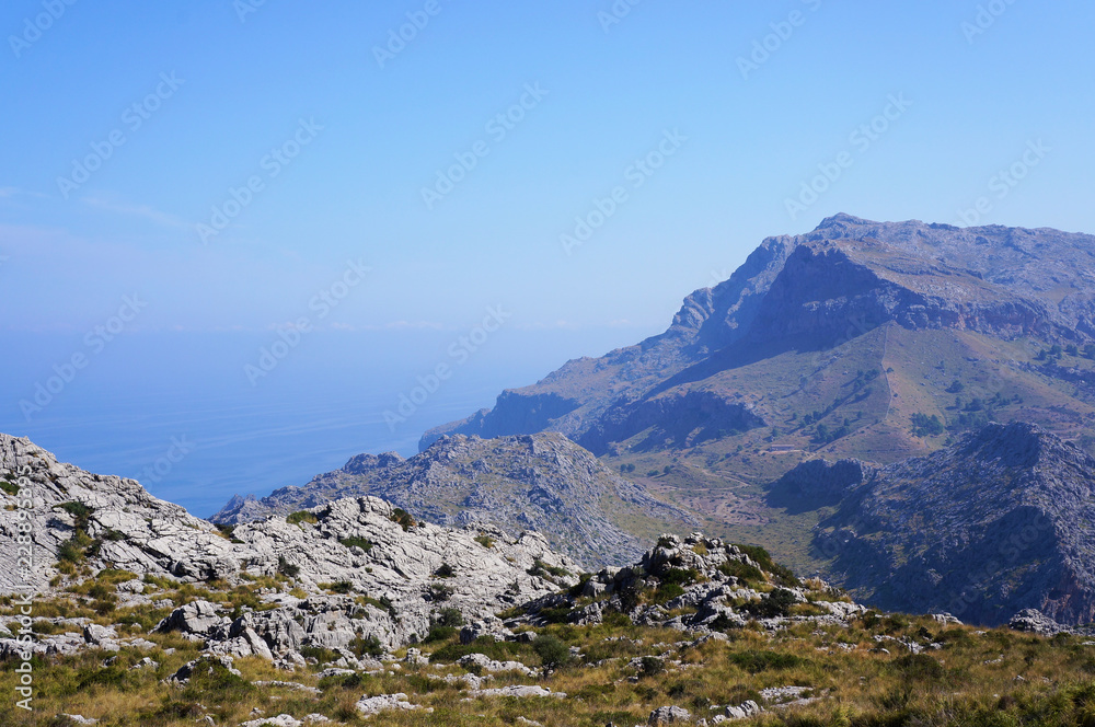 Naklejka premium View of the rocky mountains and the sea near the island of Mallorca, Spain