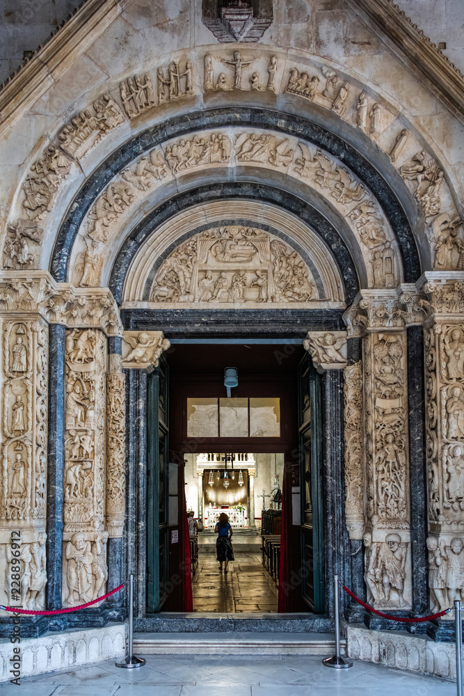 Fototapeta premium 13th century portal of the St. Lawrence cathedral in Trogir, Croatia, carved by the local architect and sculptor Master Radovan, one of the most monumental pieces of the Dalmatian medieval art.