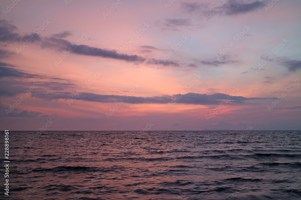 Pastel Pink and Purple Color Tropical Sunset Sky over the Gulf of Thailand with Gentle Wave, for Background or Banner 