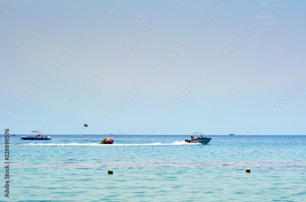 sea horizon with water transport and entertainment boats