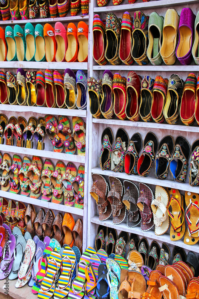 Display of shoes at the street market  in Taj Ganj neighborhood of Agra, Uttar Pradesh, India