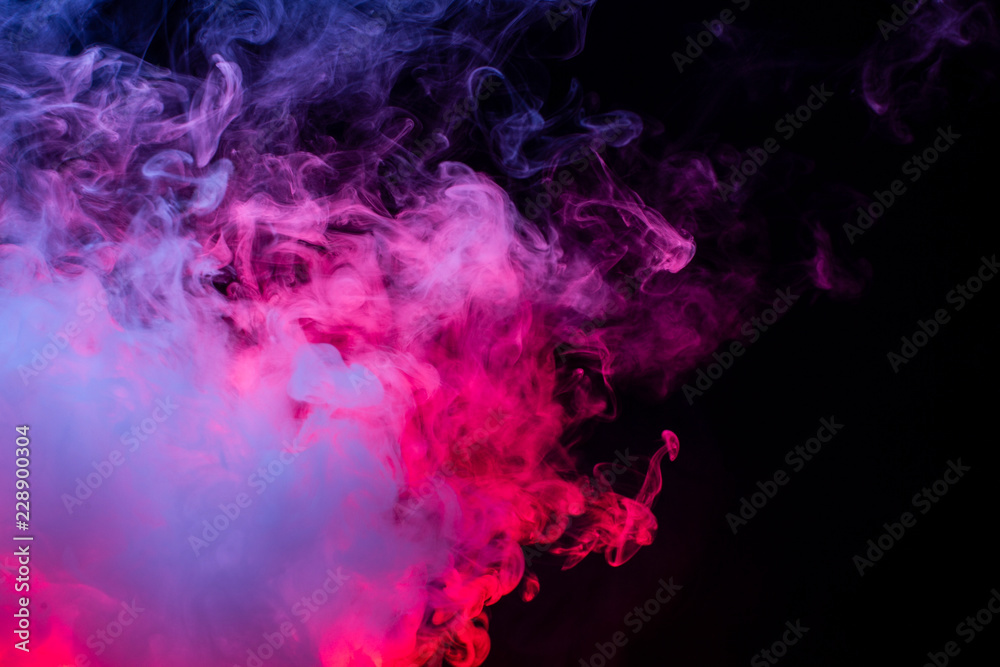 Colourful cloud of vapor. dark black background