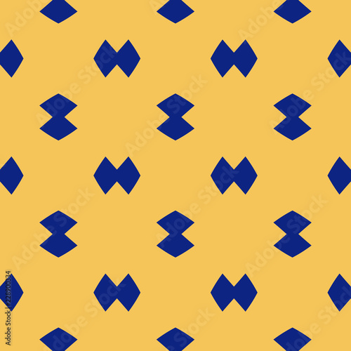 Colorful minimalist seamless pattern. Simple abstract geometric texture with rhombuses, diamond shapes. Yellow and blue minimal background. Hipster fashion style. Cute funky pattern. Repeat design