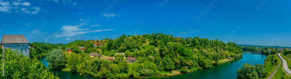 River Kupa panorama landscape. / Panorama of colorful landscape in Ozalj town, tourist resort in Central Croatia, Europe.