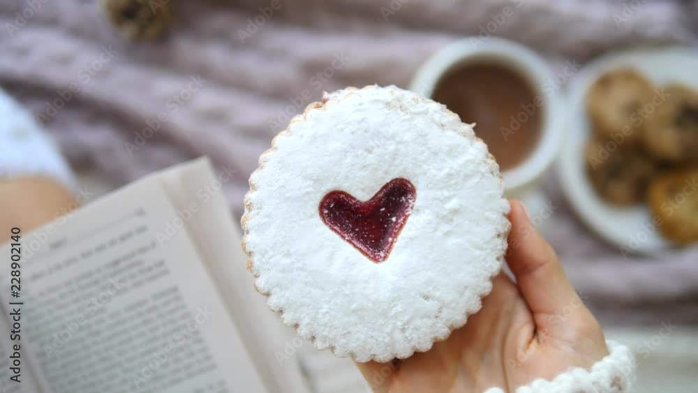 Woman Hand Holding Cookie With Heart Woman Hand Holding Cookie With Heart