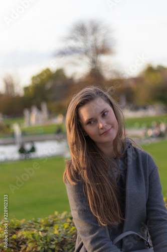 portrait of young woman in autumn park