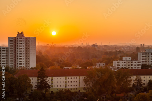 Sonnenaufgang über der Skyline von Berlin Neukölln, Aufnahme aus der 12. Etage photo