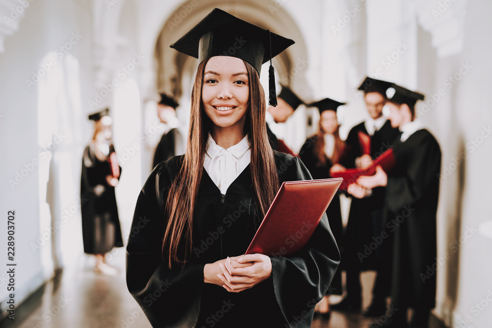 Asian Girl. Standing. Corridor. University. Robes.