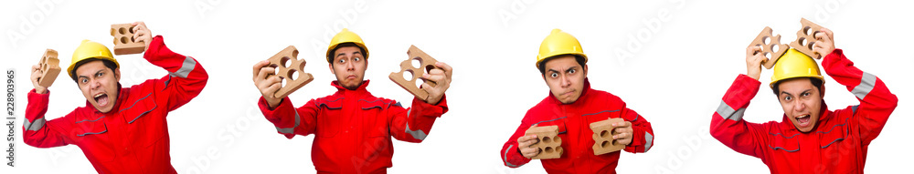 Construction worker with clay bricks on white
