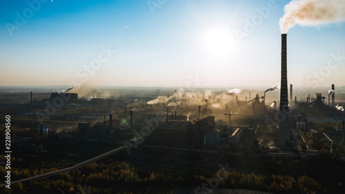 industrial landscape with heavy pollution produced by a large factory.