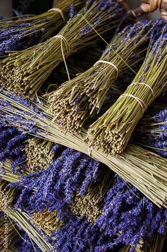 Bunches of dry lavender and healthy spa lifestyle stall at organic farmer market in Provence, France.