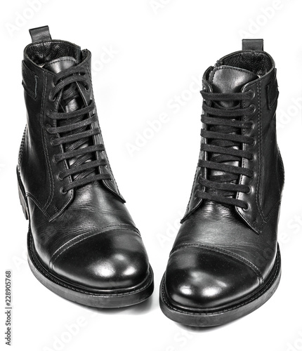 Fotografija The high black leather boots isolated on white background