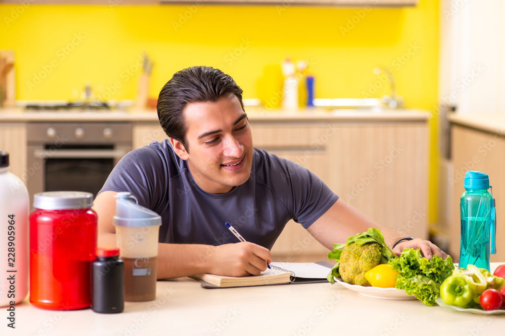 Young man in healthy eating concept Young man in healthy eating concept