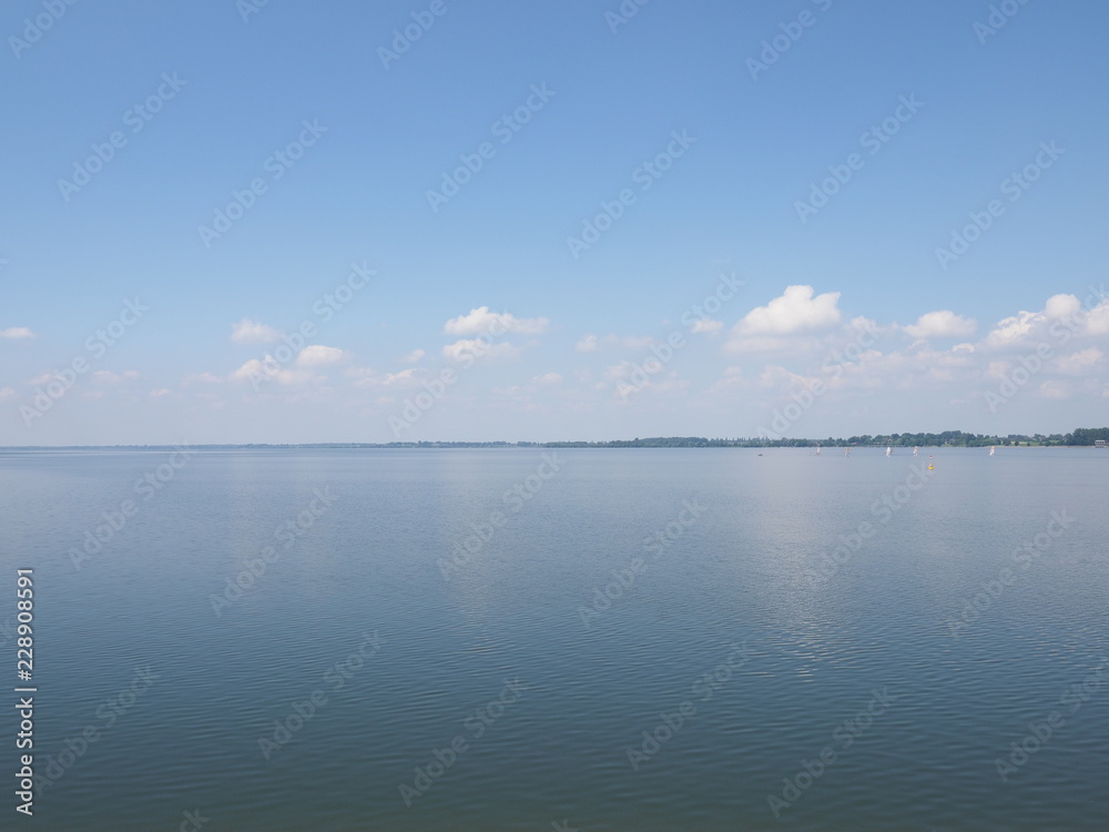 Quite landscape of artificial european Goczalkowice Reservoir in Poland with beauty clouds on blue sky