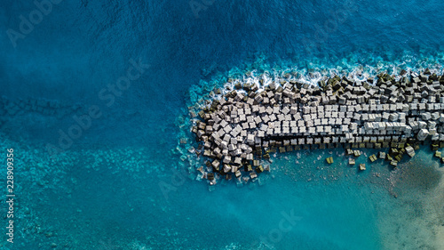 drone top view of tetrapods photo
