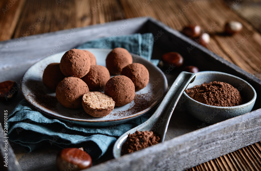 Chestnut truffles coated with cocoa powder Chestnut truffles coated with cocoa powder