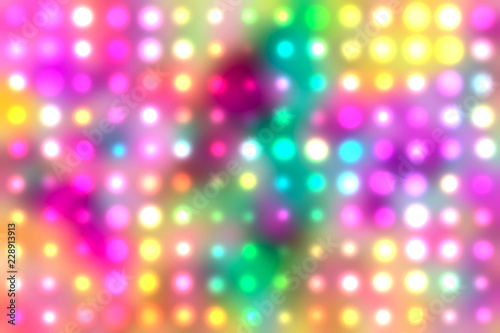 Abstract multicolored kaleidoscope glowing defocused confetti pattern.