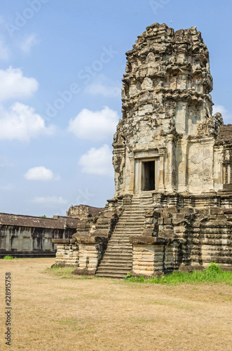 Tower of Angkor Wat with the steep stairways photo