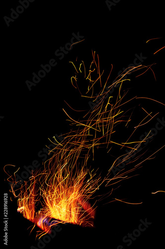 Fire with sparks flying in air