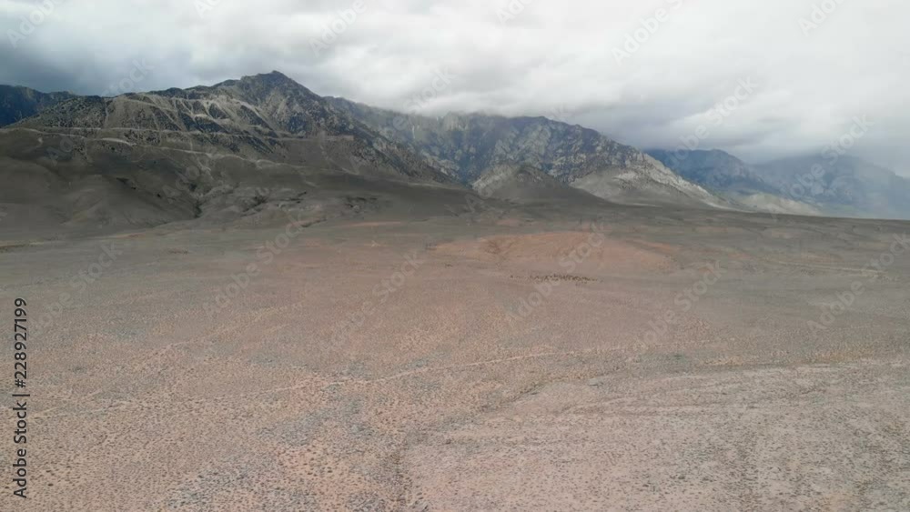 Aerial Shot of Eastern Sierra Nevada Mountains Stormy Clouds Aerial Shot of Eastern Sierra Nevada Mountains Stormy Clouds