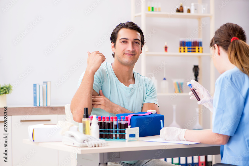 Young patient during blood test sampling procedure Young patient during blood test sampling procedure