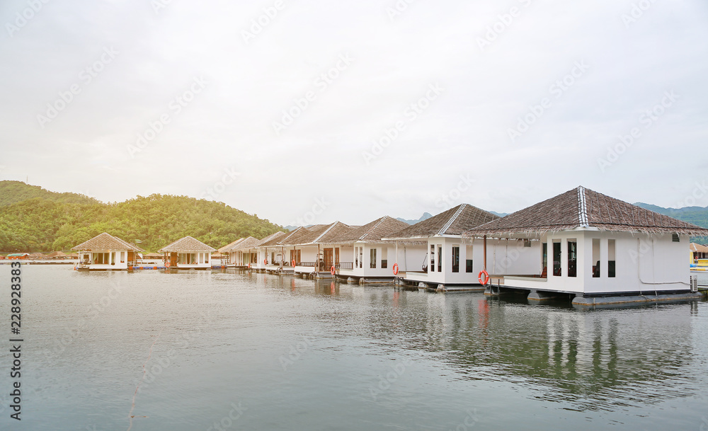 Raft House floating on the river with mountain at kanchanaburi, Resort in thailand. Raft House floating on the river with mountain at kanchanaburi, Resort in thailand.