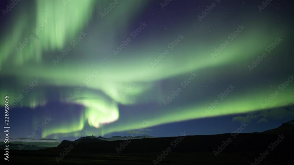 Full sky bright aurora borealis over mountain plain, Skaftafell Iceland.mov Full sky bright aurora borealis over mountain plain, Skaftafell Iceland.mov