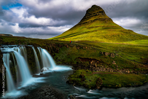 Iceland. Kirkjufellsfoss waterfall with Kirkjufell mountain - one of Iceland's most iconic views.