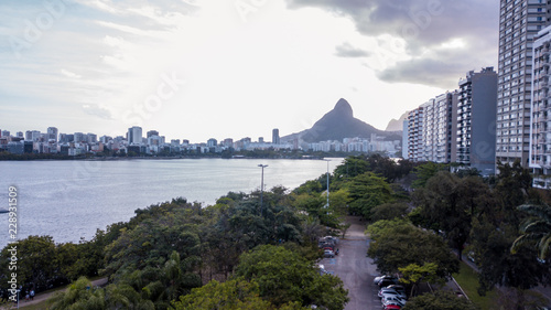 aerial view of the drone of the lagoon in rio de janeiro and copacabana, at dusk