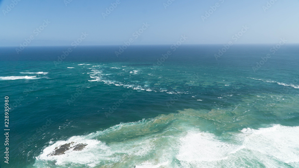 The meeting of two bodies of water - the Tasman Sea and the Pacific Ocean, New Zealand