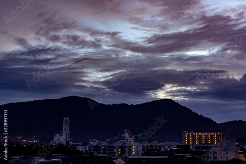 Obraz na płótnie Dusk looking out over the city of Patong, Phuket Thailand. w salonie