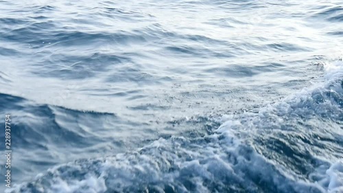 Slow Motion Sea Wave in front of a Ship, Boat or Cruise.