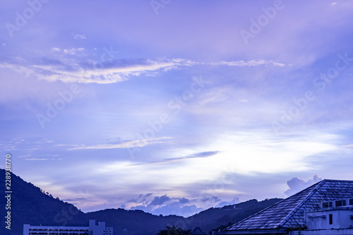 Obraz na płótnie A dramatic sunrise over the city of Patong from the southern hillside. w salonie